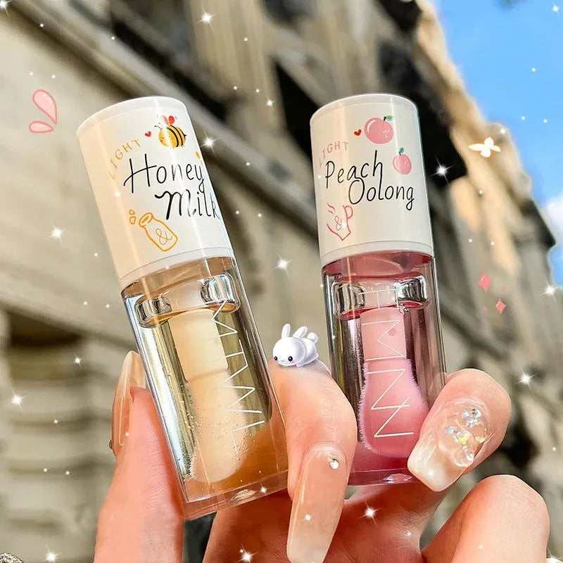 Gloss Labial White Peach & Honey – Lábios Macios, Perfumados e Irresistíveis