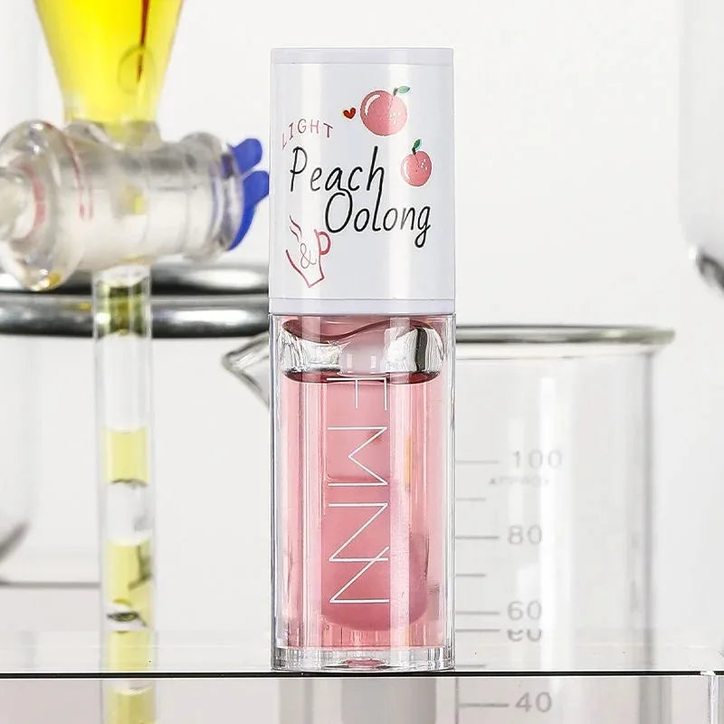 Gloss Labial White Peach & Honey – Lábios Macios, Perfumados e Irresistíveis