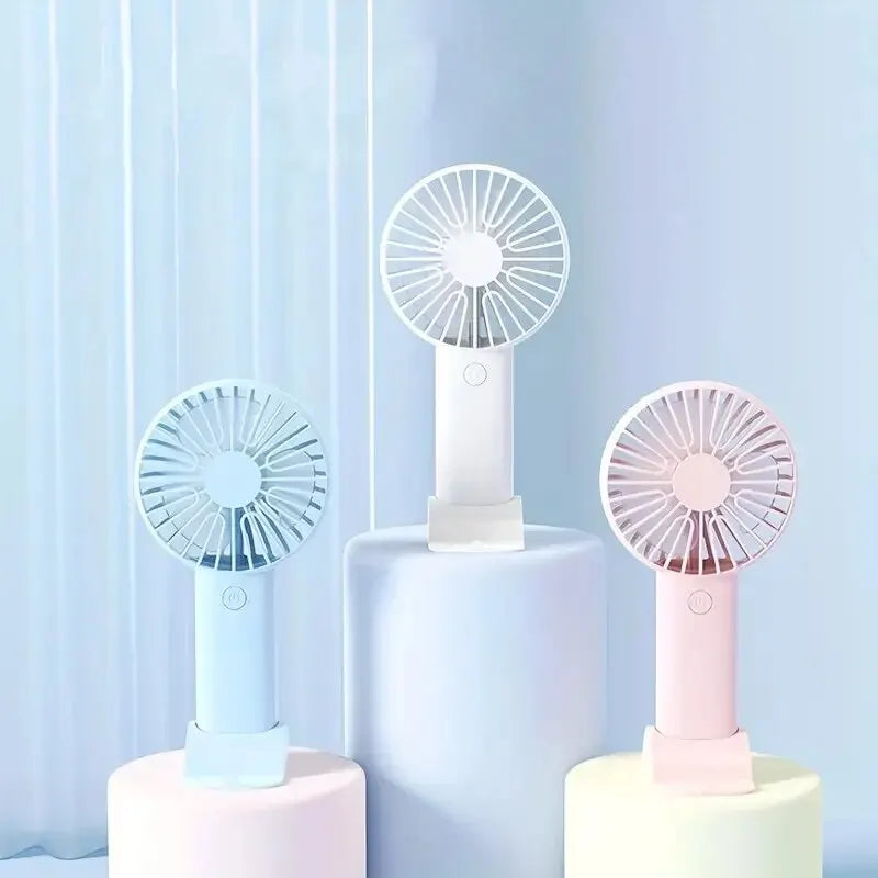 Ventilador de Mão Recarregável com Base de Apoio para Smartphone – Conforto e Lazer